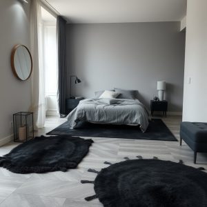 Grey Flooring with Black Rugs